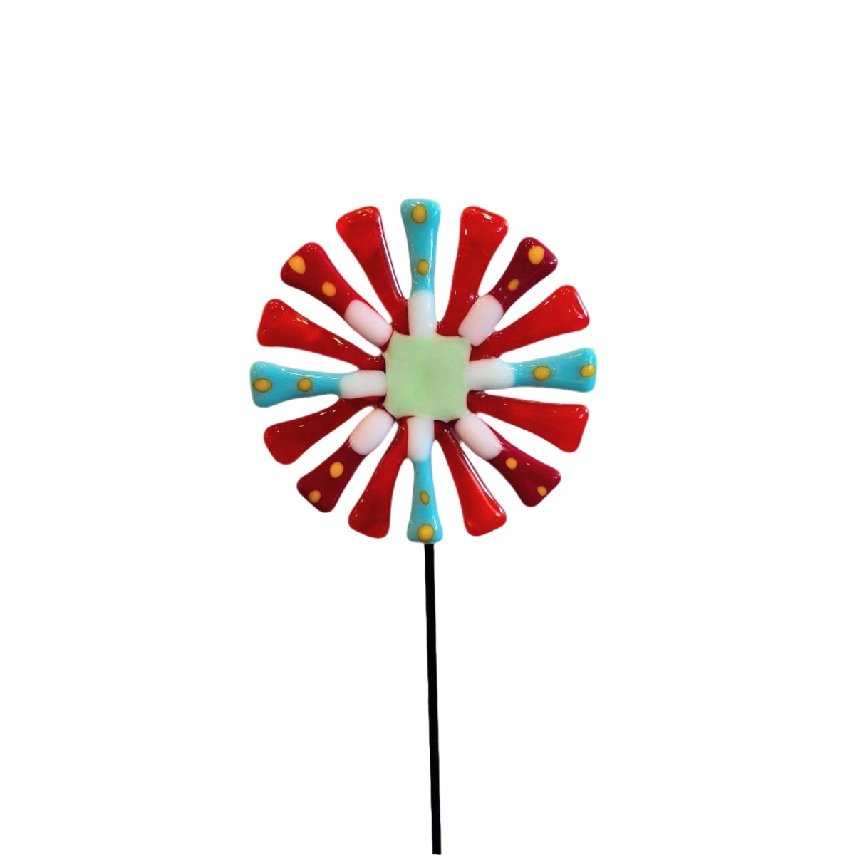 Decorative handmade glass flower with red, blue, and white petals.