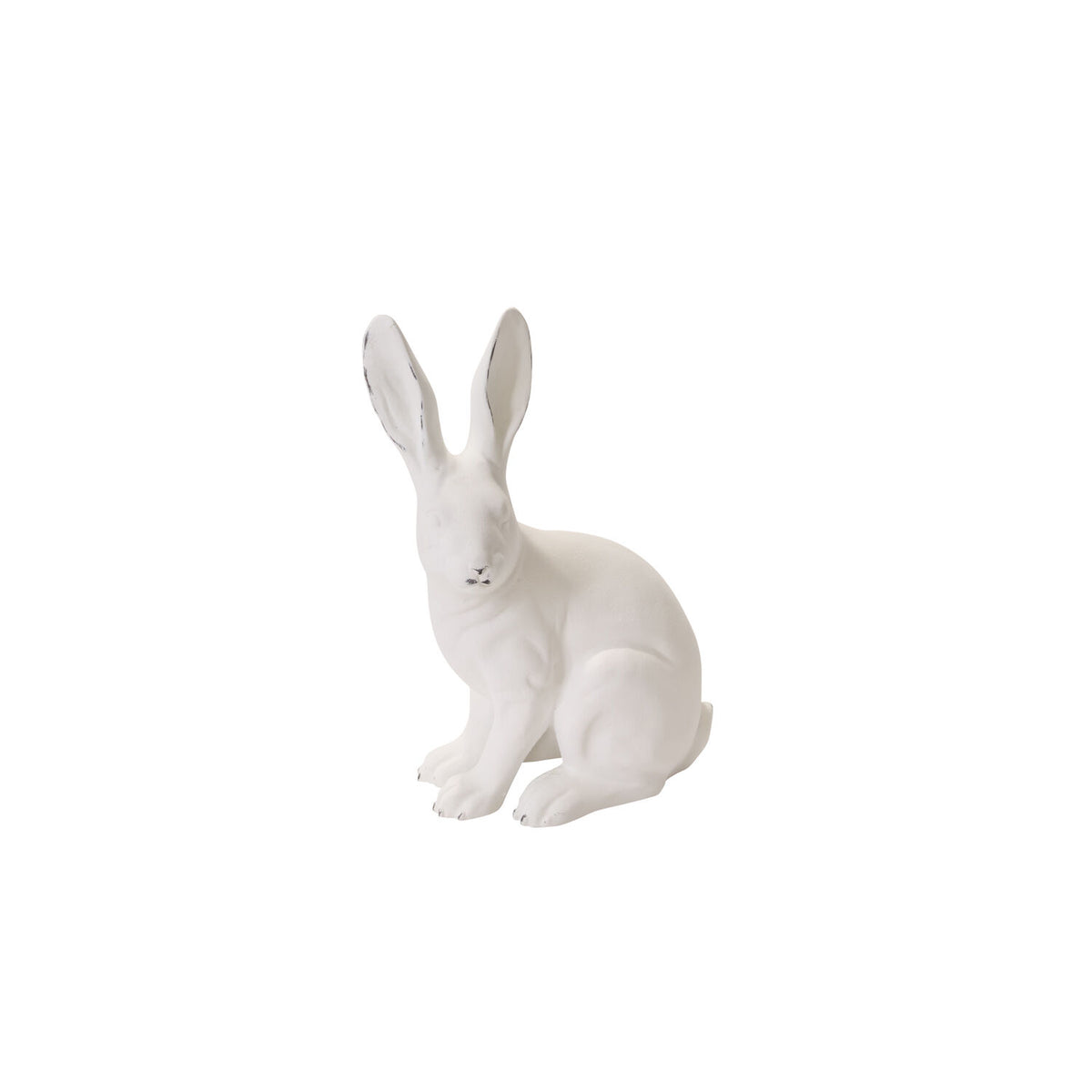 White ceramic rabbit figurine on a white background
