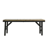 Wooden table with black metal legs on a white background