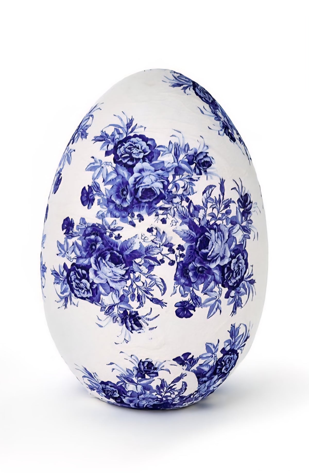 Decorative egg with blue floral pattern on a white background