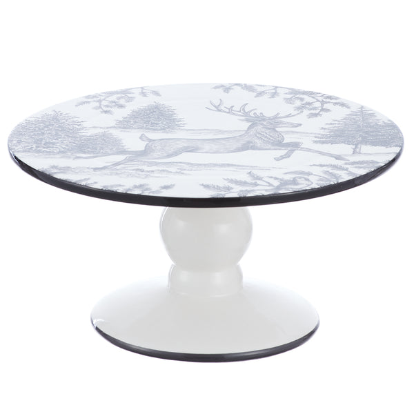 A round pedestal table featuring a white tabletop with a gray toile-style print of a deer and trees, supported by a glossy white round pedestal base with a thin black rim.