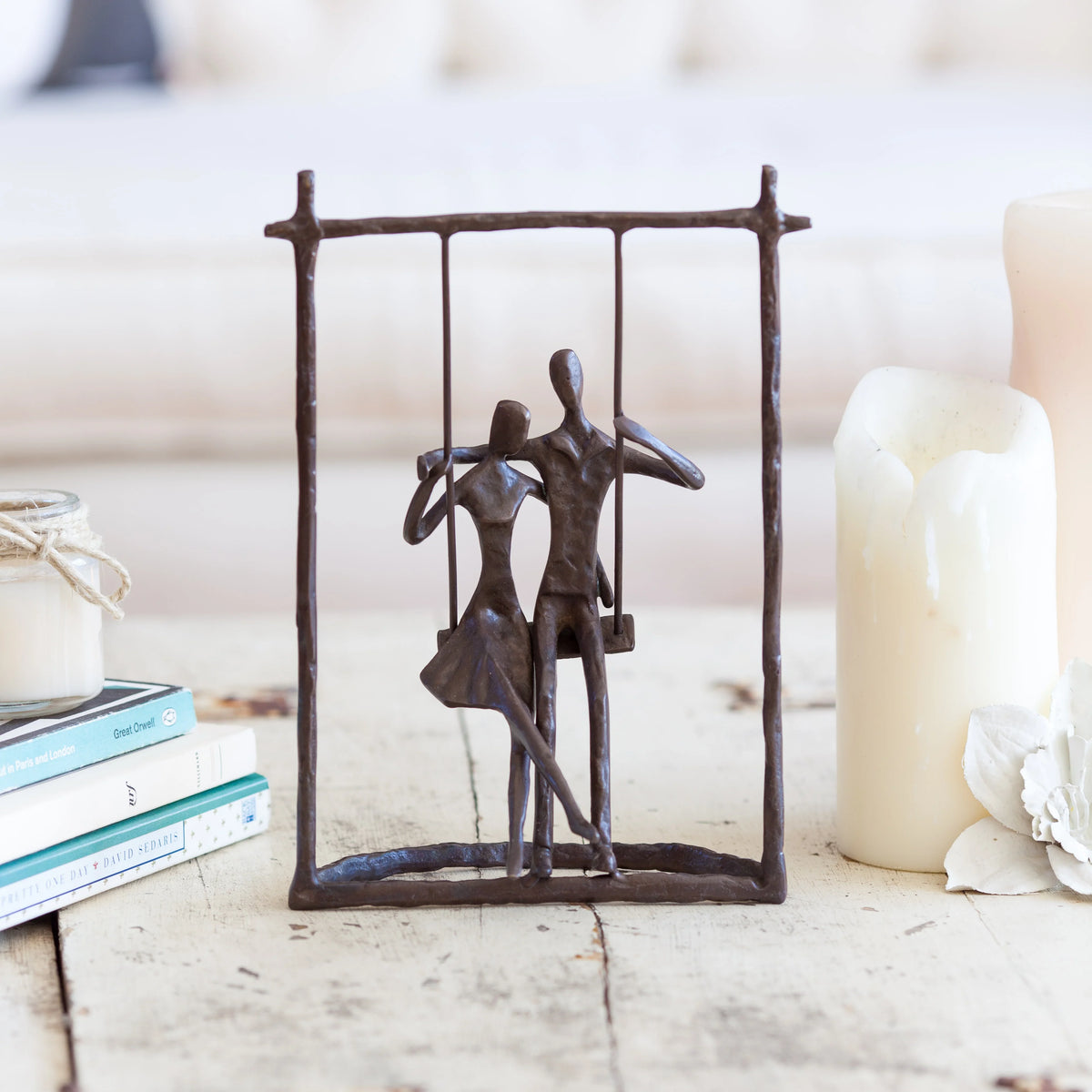 Couple on a Swing Cast Bronze Sculpture | Danya B.