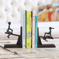 Children Playing on a See-Saw Metal Bookend Set | Danya B.