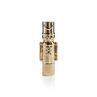 Gold-colored nutcracker figurine on a white background