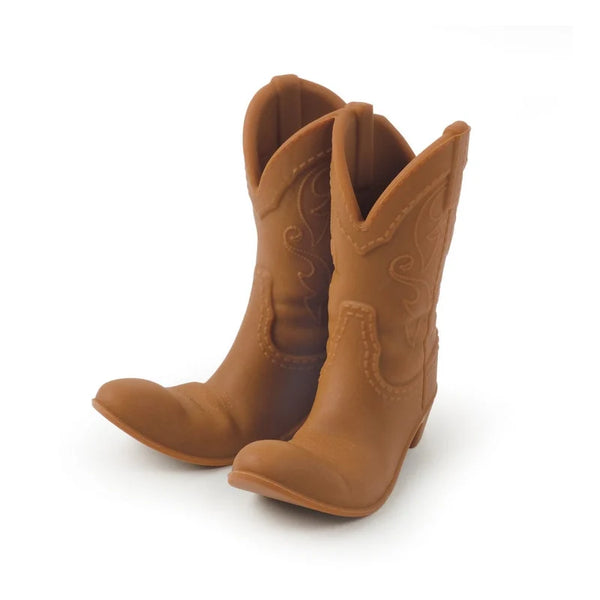 Pair of brown cowboy boots to act as a phone stand on a white background