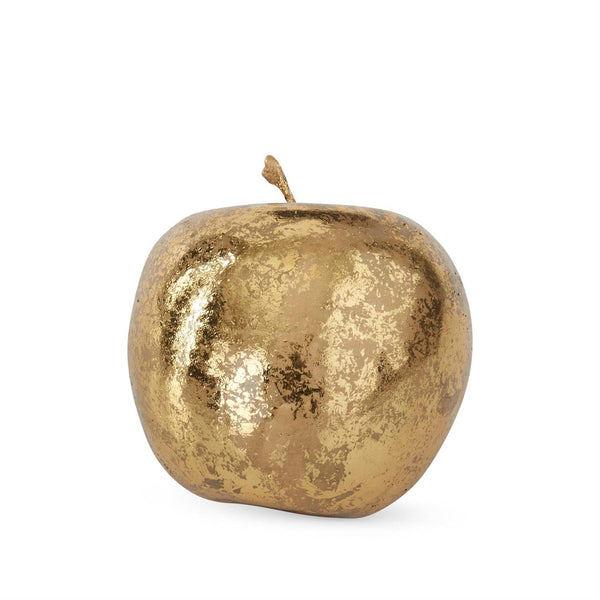 A decorative apple sculpture with a textured, metallic gold finish and a short stem, shown on a plain white background.