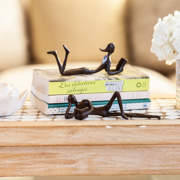 Man and Woman Leisurely Reading a Book Bronze Sculptures (2 Piece Set) | Danya B.