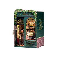 Model of a bookstore with decorative elements on a white background