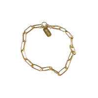 Gold chain bracelet on a white background