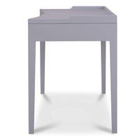 A side view of a gray rectangular desk with three drawers on a white background.