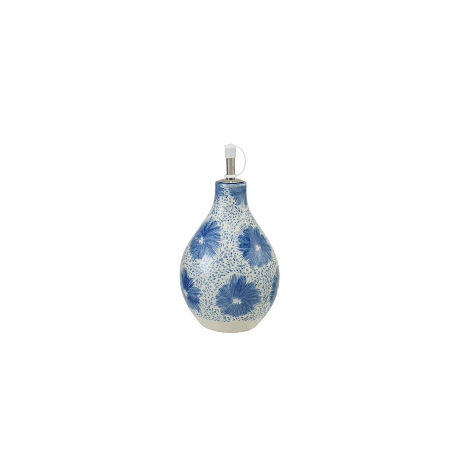 Decorative round oil bottle with blue floral patterns on a white background