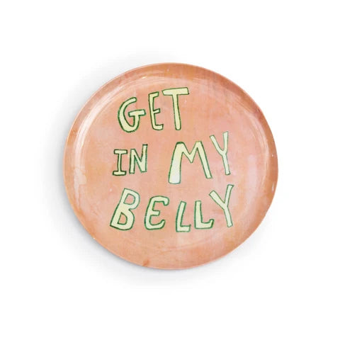 A round terracotta-colored melamine plate with the phrase 'GET IN MY BELLY' written in a light green hand-painted font, shown on a plain white background.