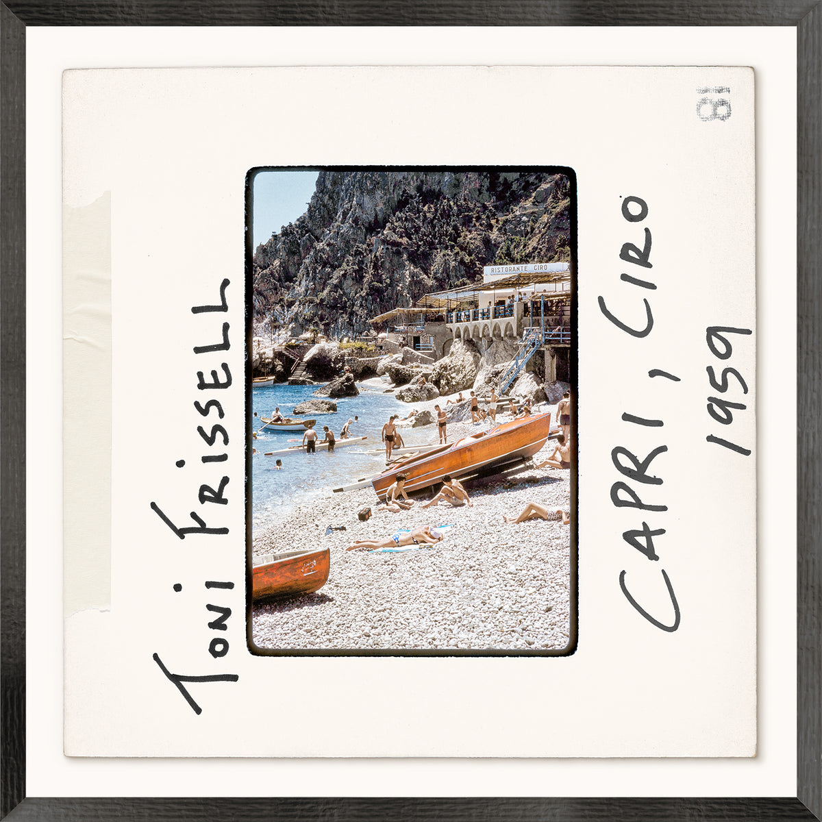 Framed photograph of a beach scene with boats and people, labeled 'Capri, Ciro 1959' by Toni Frissell.