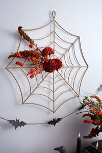 Antiqued Gold Metal Cobweb Wall Hanging