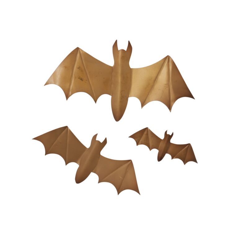 Three golden metal bat wall decor pieces on a white background.