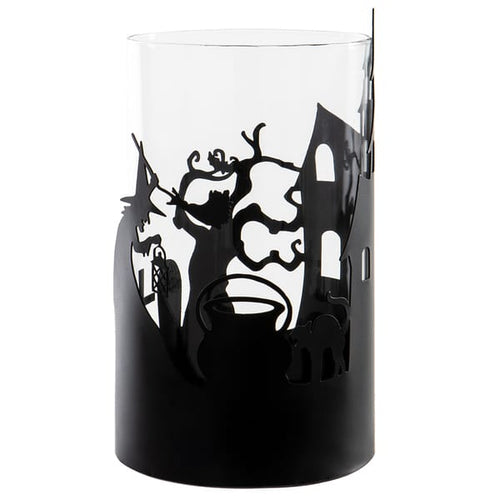 A black cylindrical candle holder or vase with a Halloween-themed silhouette cutout design featuring a witch, cat, cauldron, and haunted house, shown against a plain white background.