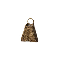 Brown woven bag with a circular handle on a white background